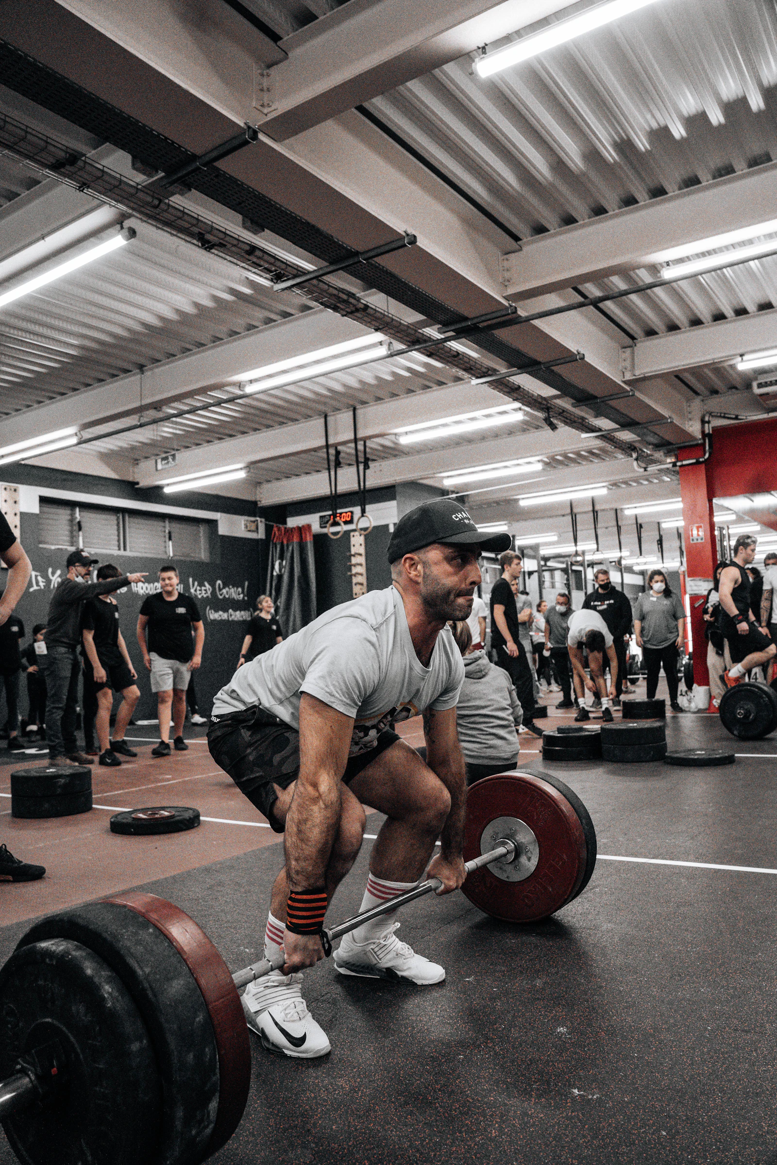 Athlete performing a barbell squat during strength training