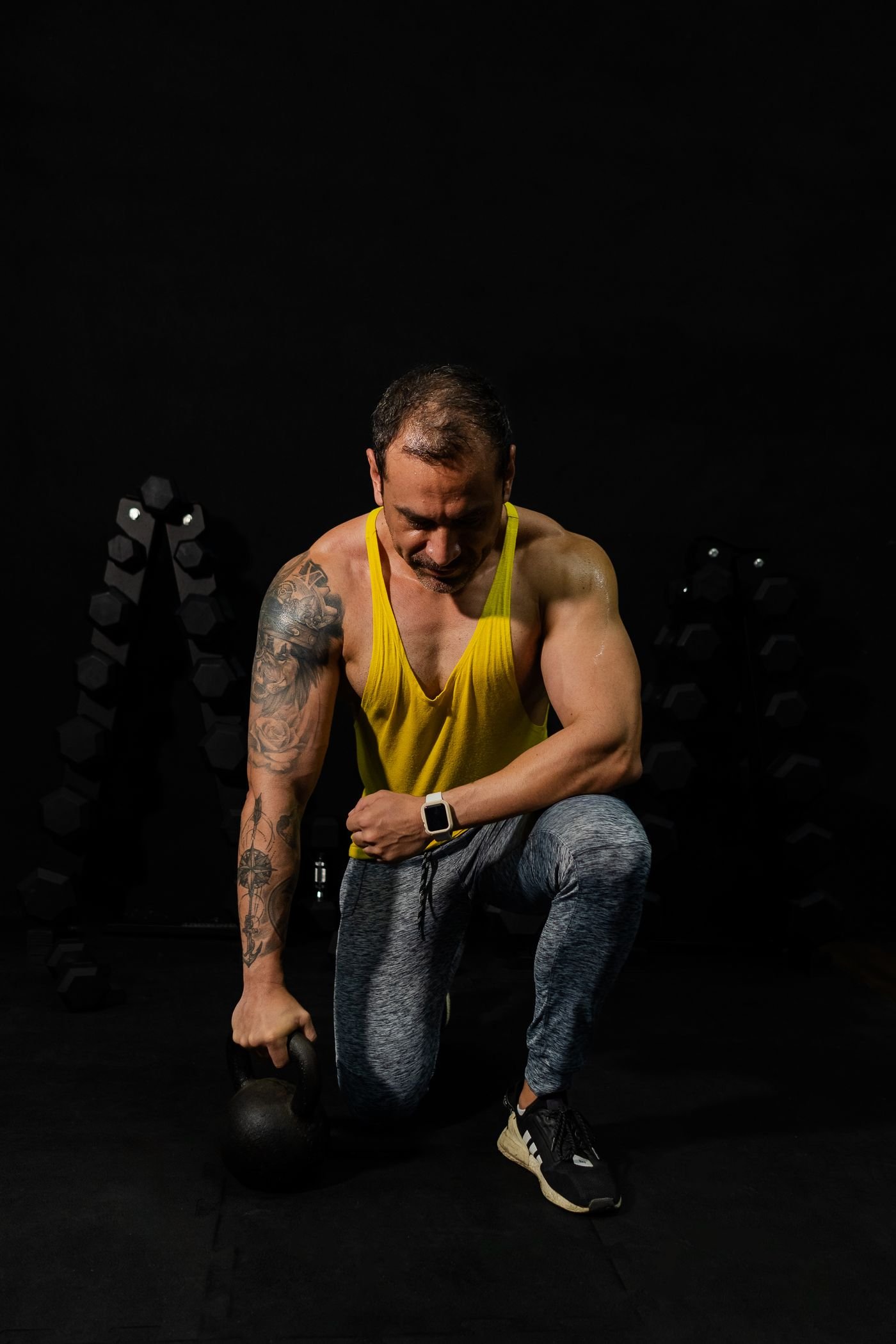 Athlete training with a kettlebell in a gym
