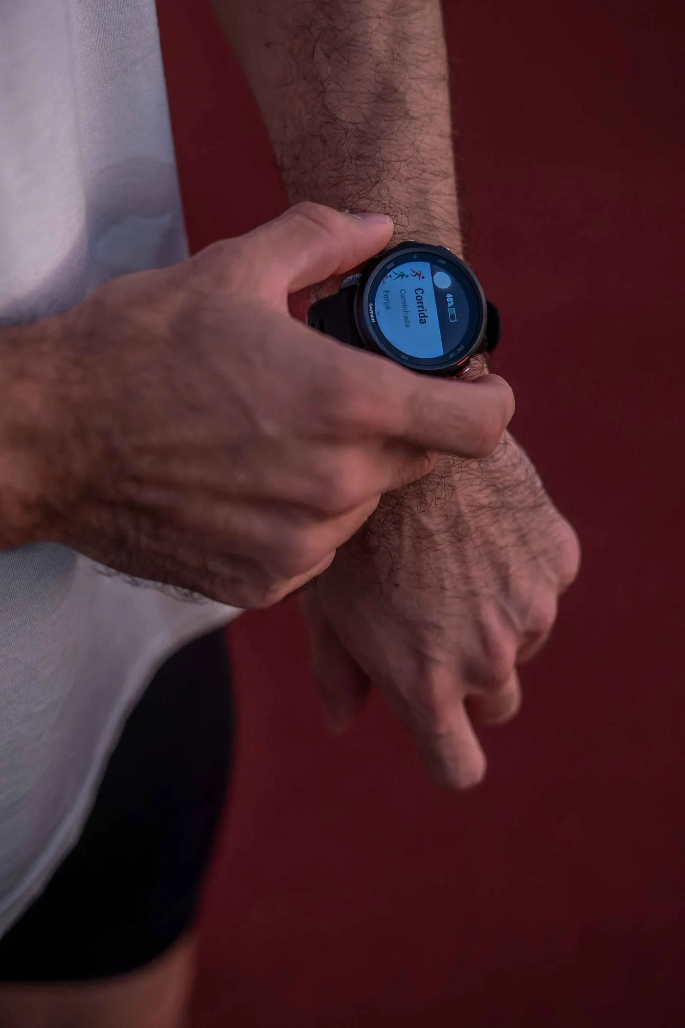 Runner checking a smartwatch after a training session