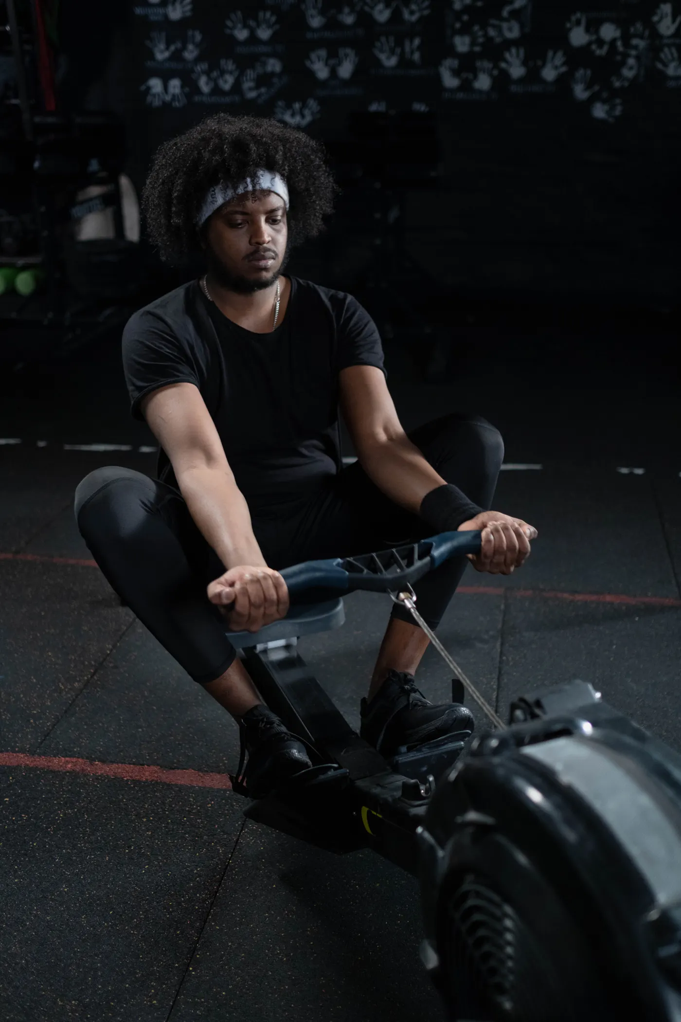 Athlete training on an indoor rowing machine