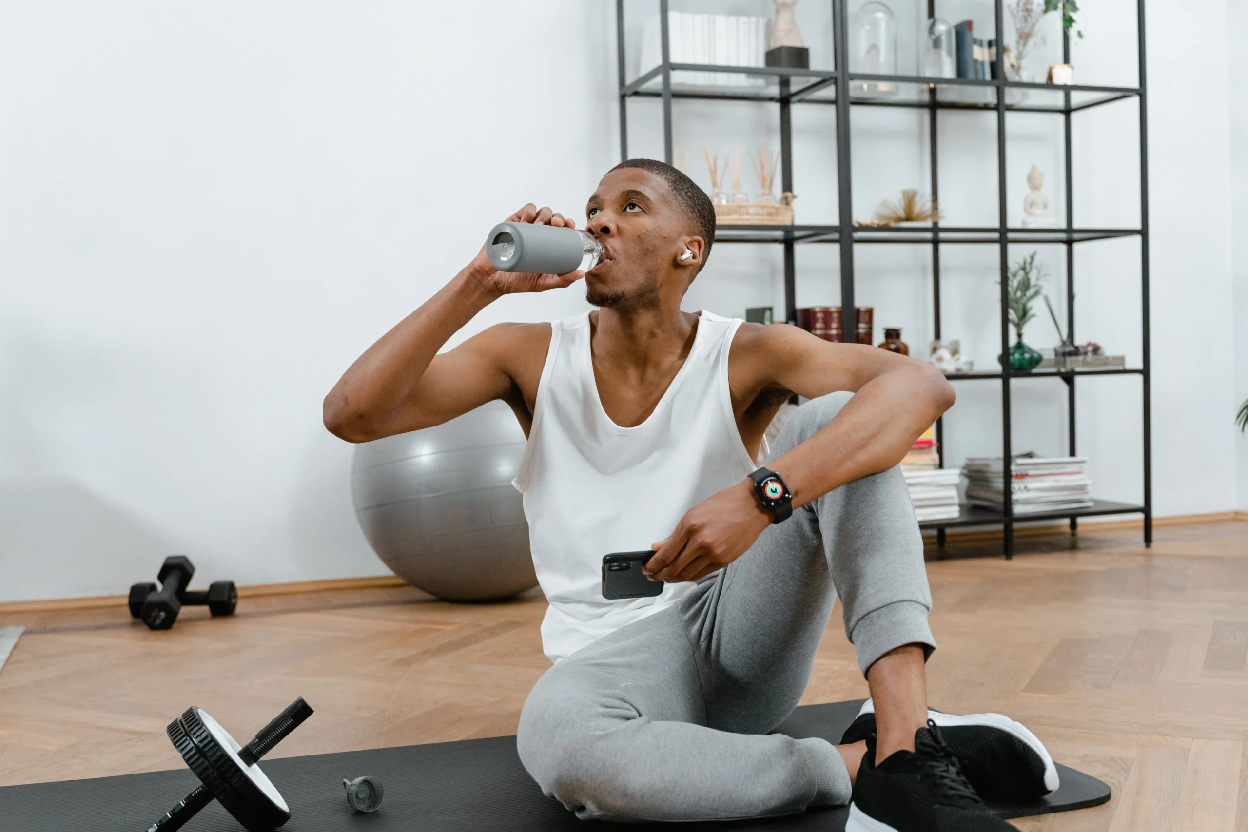 Athlete drinking water after a workout