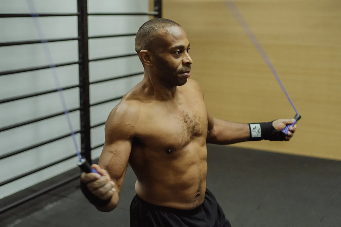 Athlete using a jump rope to practice repeated springy contacts
