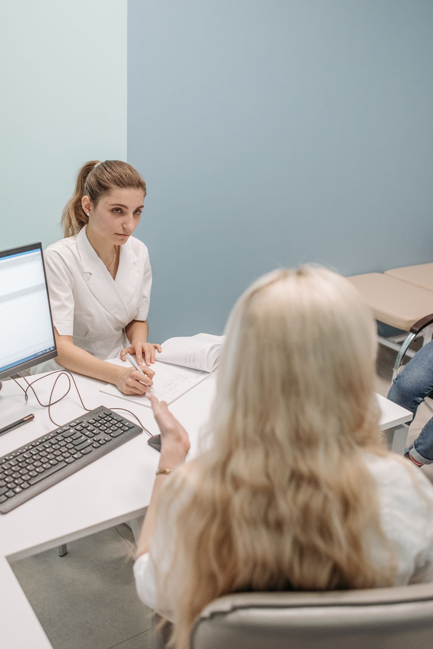Healthcare professional discussing a plan with a patient