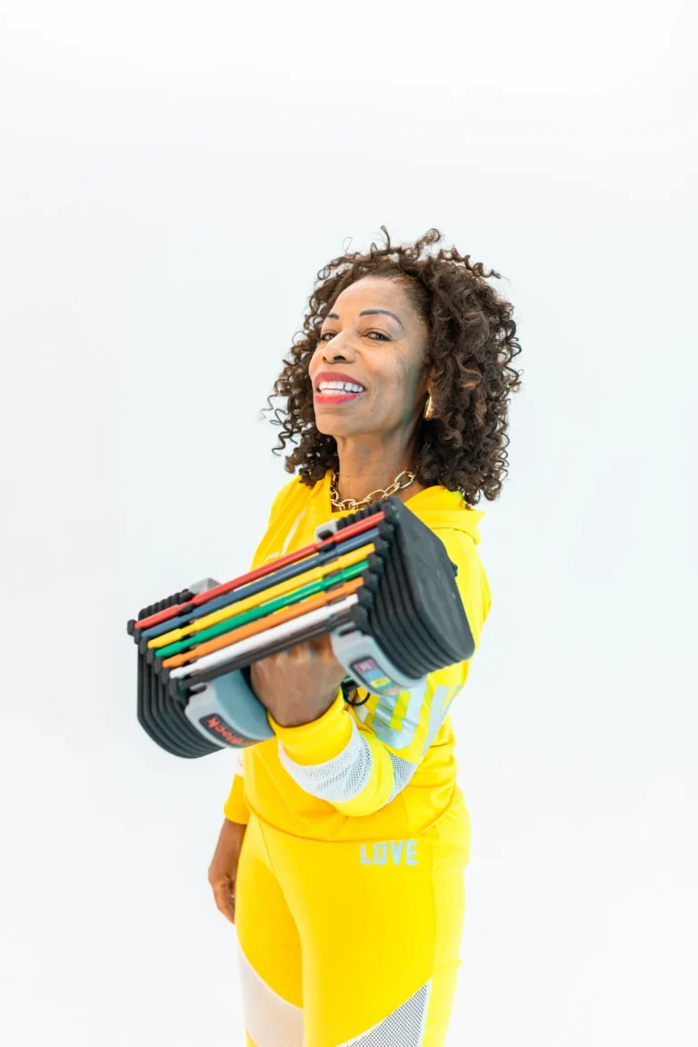 Older woman exercising with hand weights