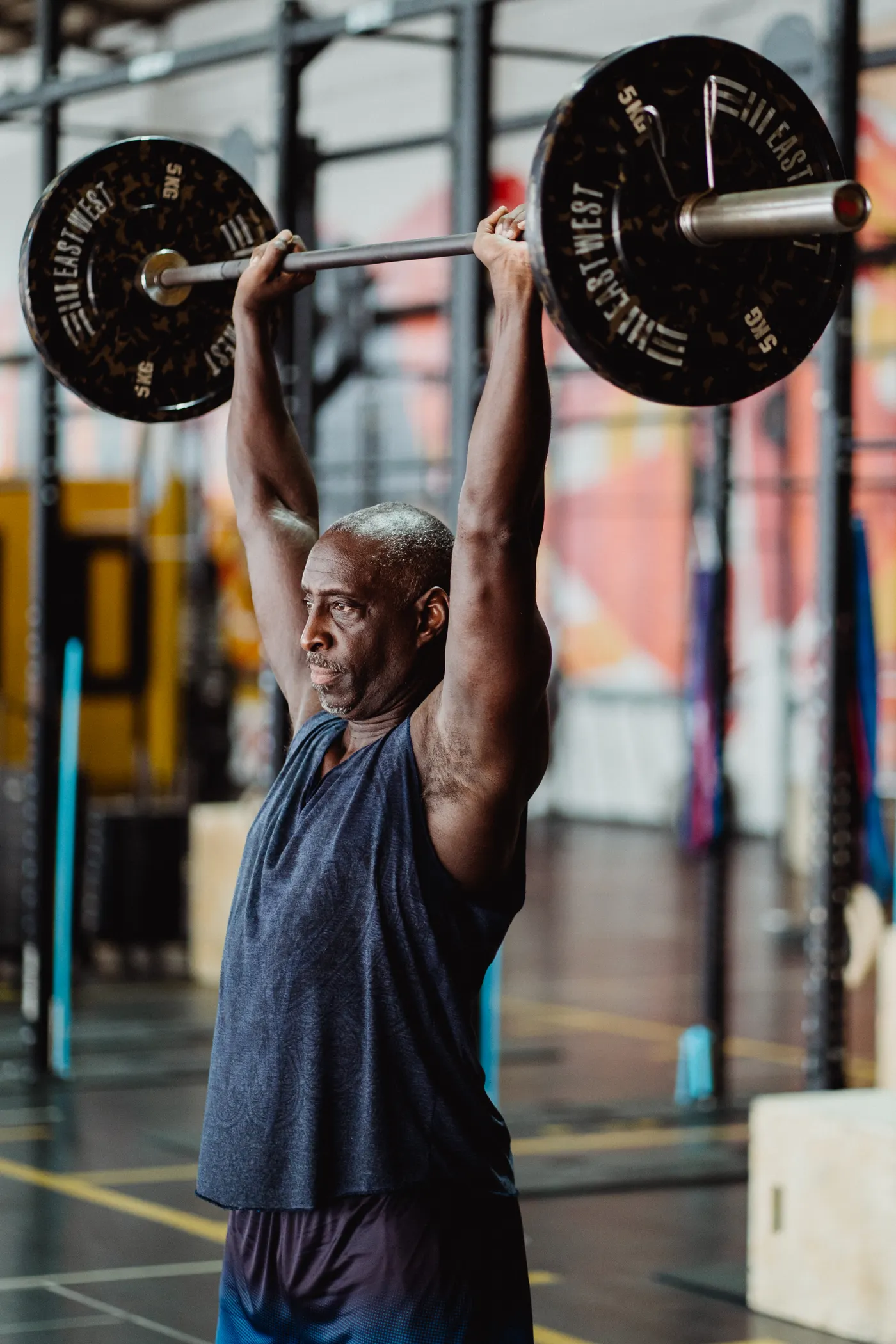 Lifter working with a barbell during strength training