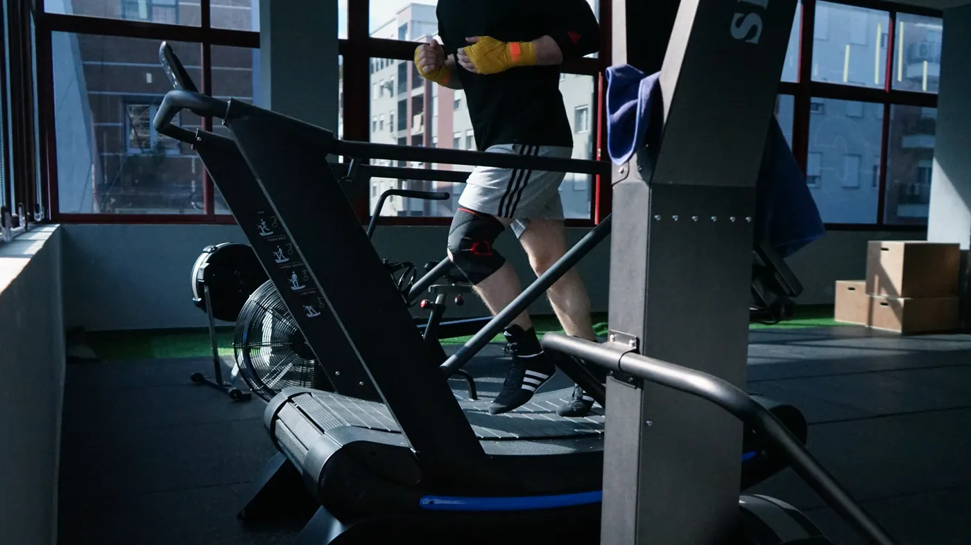 Man exercising on a treadmill at a fitness center