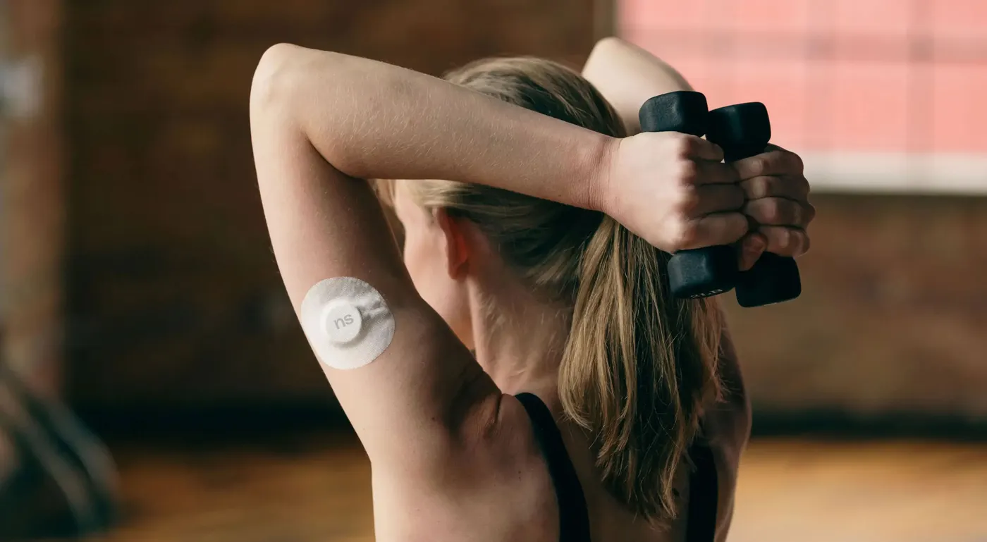 Woman exercising with a dumbbell