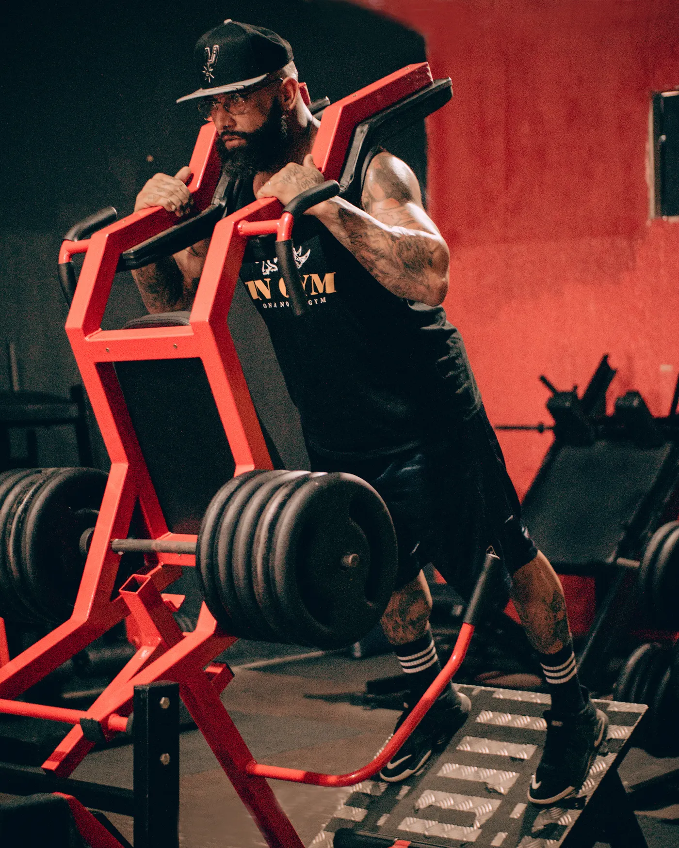 Athlete performing a leg press exercise