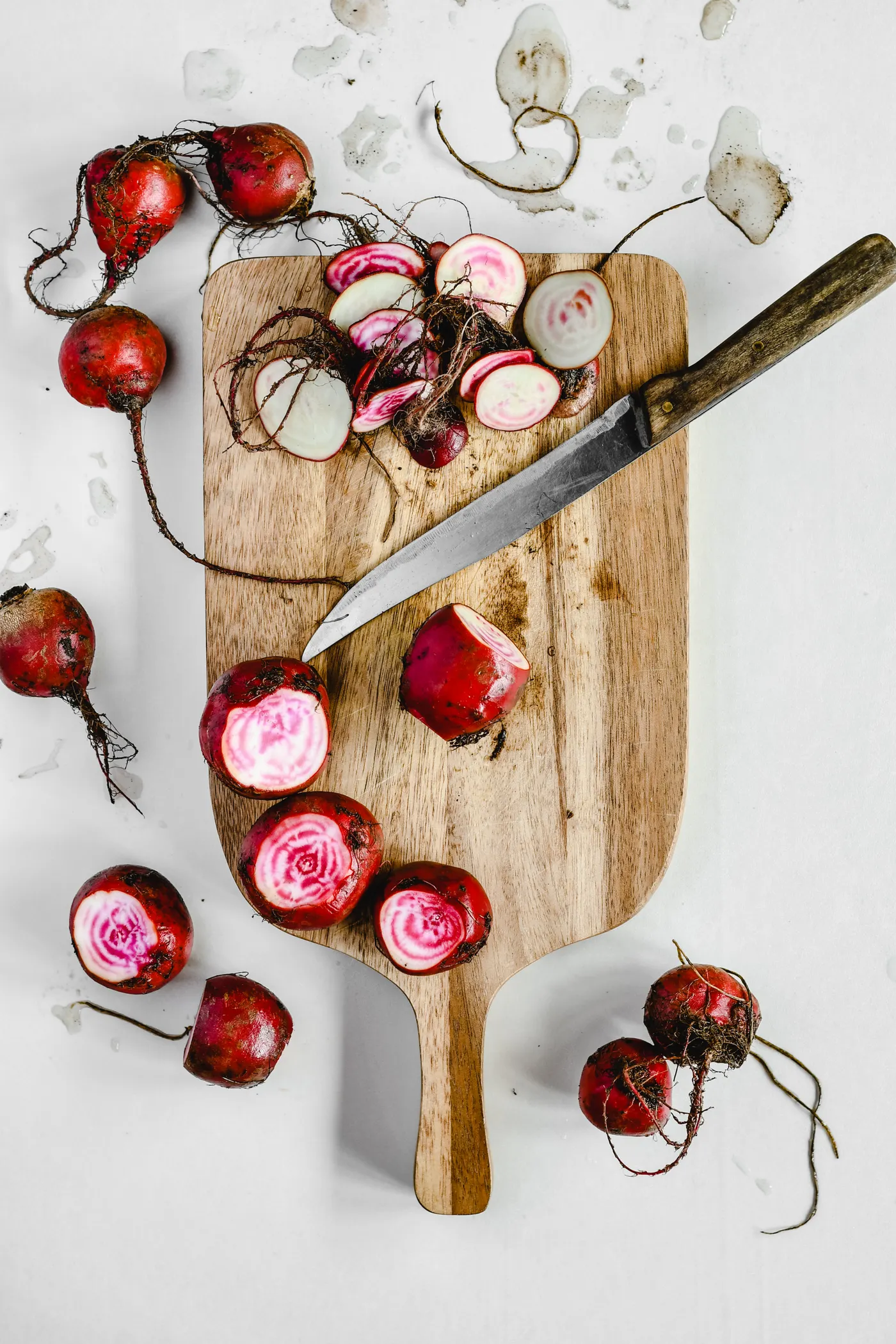 Sliced beetroot on a wooden preparation board