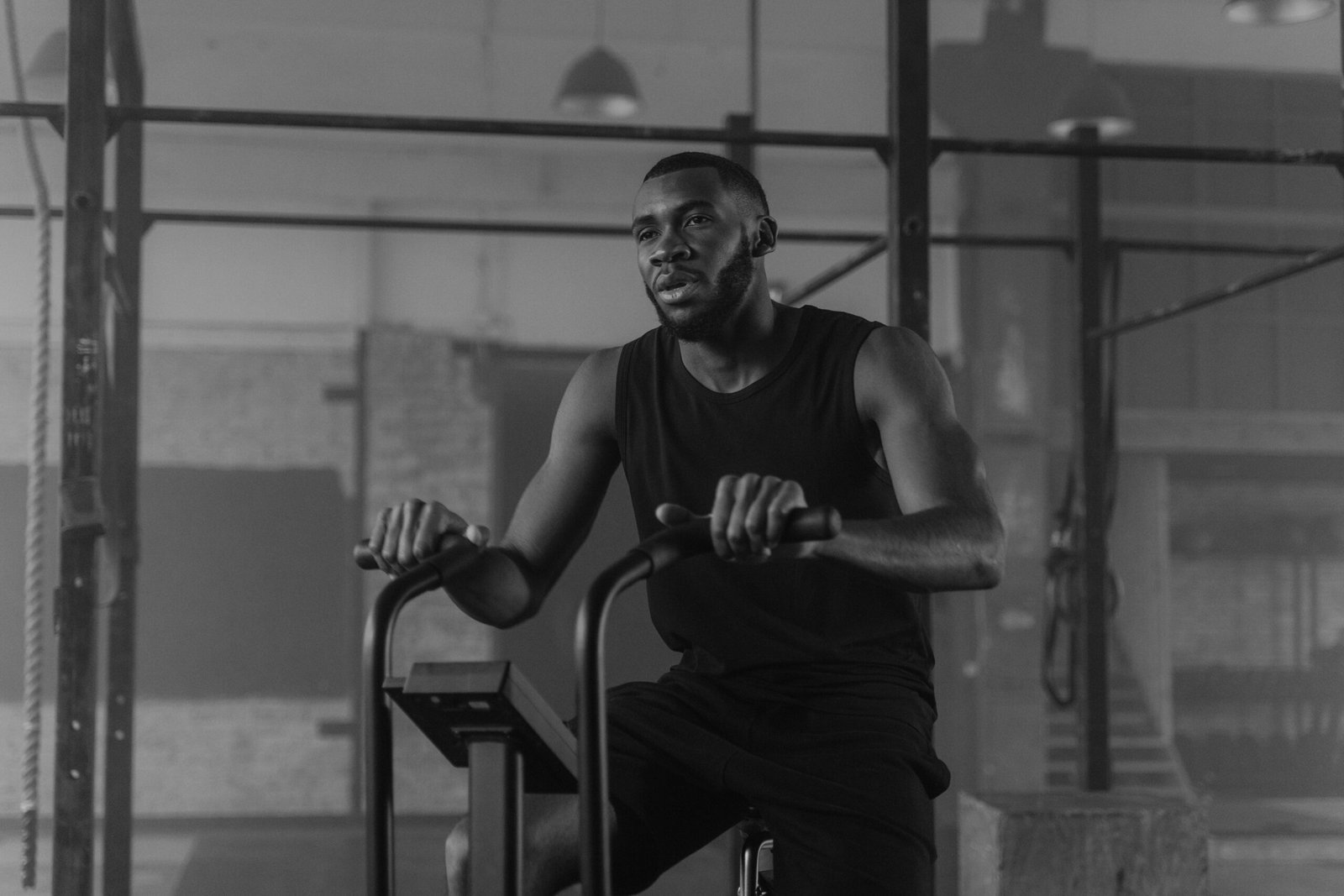 Athlete riding a stationary bike during indoor cardio training
