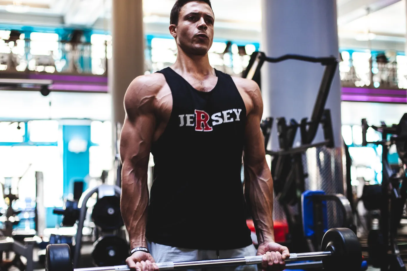 Man lifting a barbell during a strength-training session