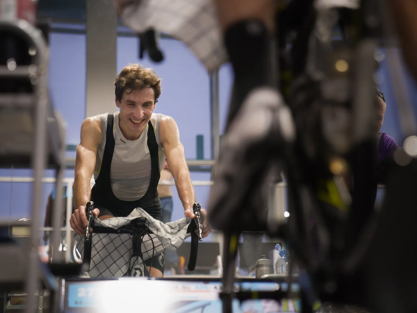 Man using an indoor exercise bike for low-impact cardio
