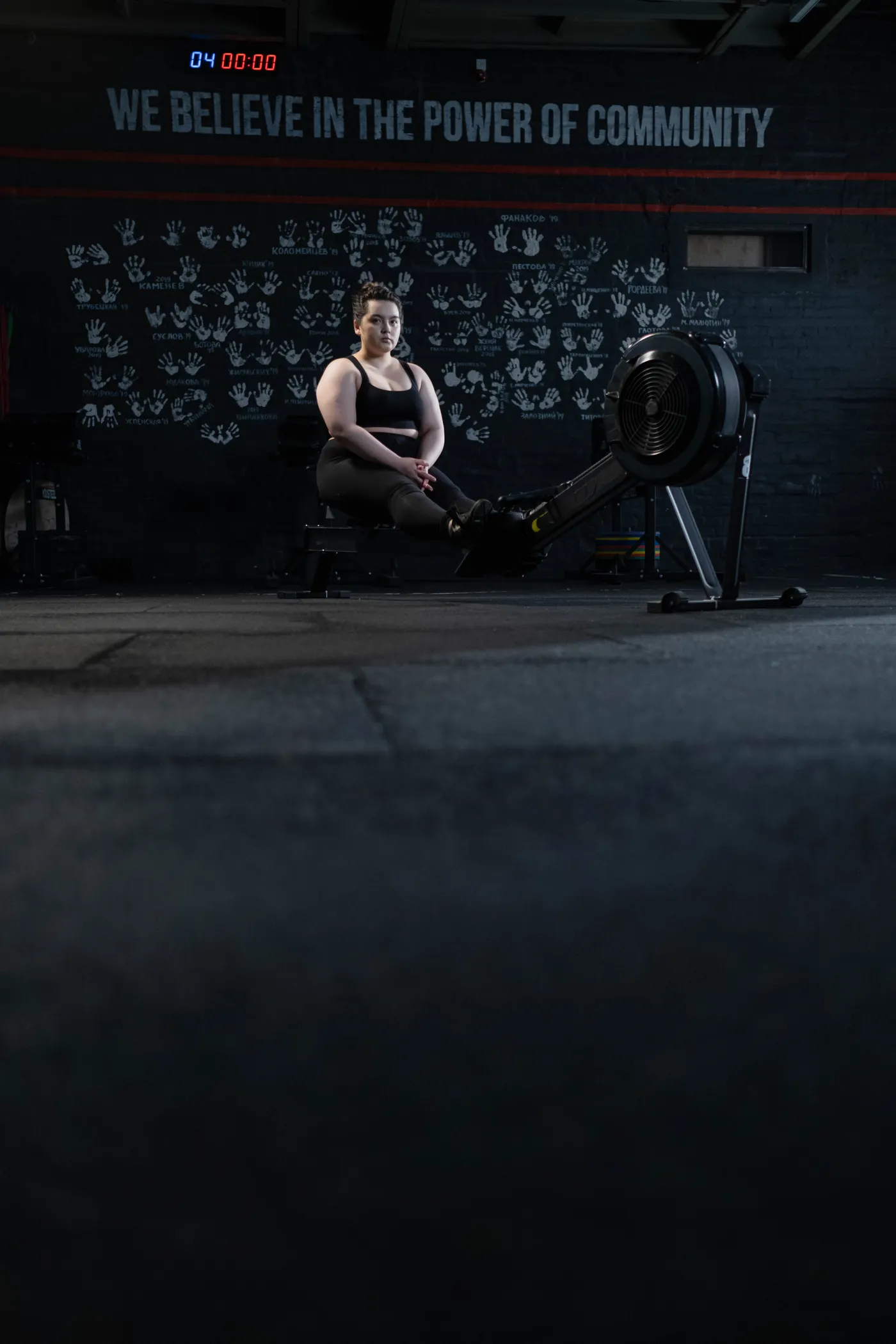 Woman exercising on an indoor rowing machine
