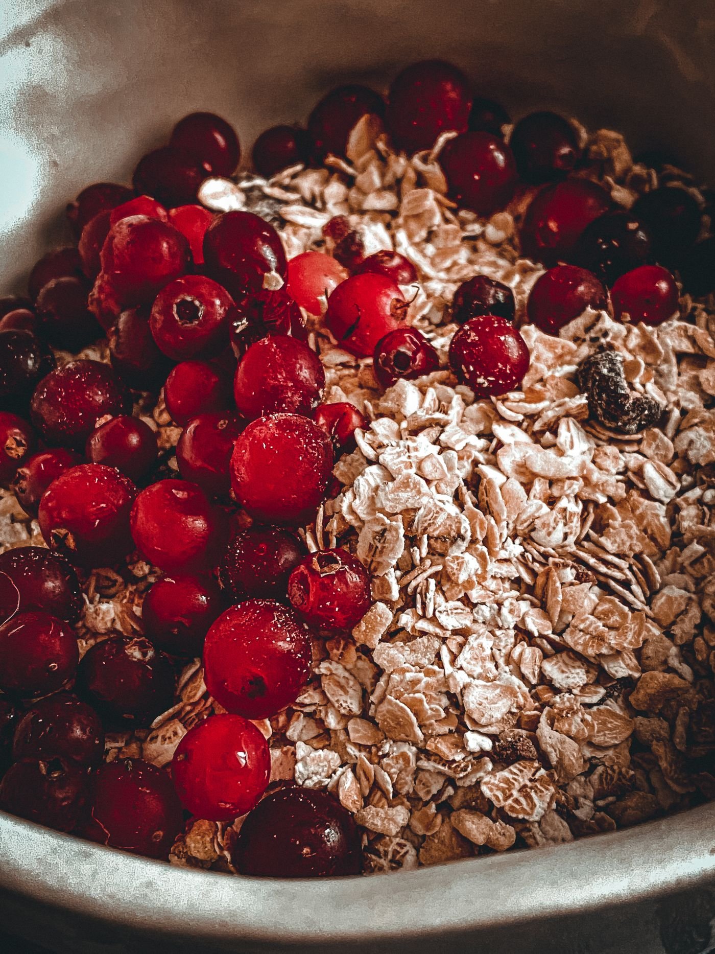 Oats and berries in a breakfast bowl, illustrating nutrient-rich meals