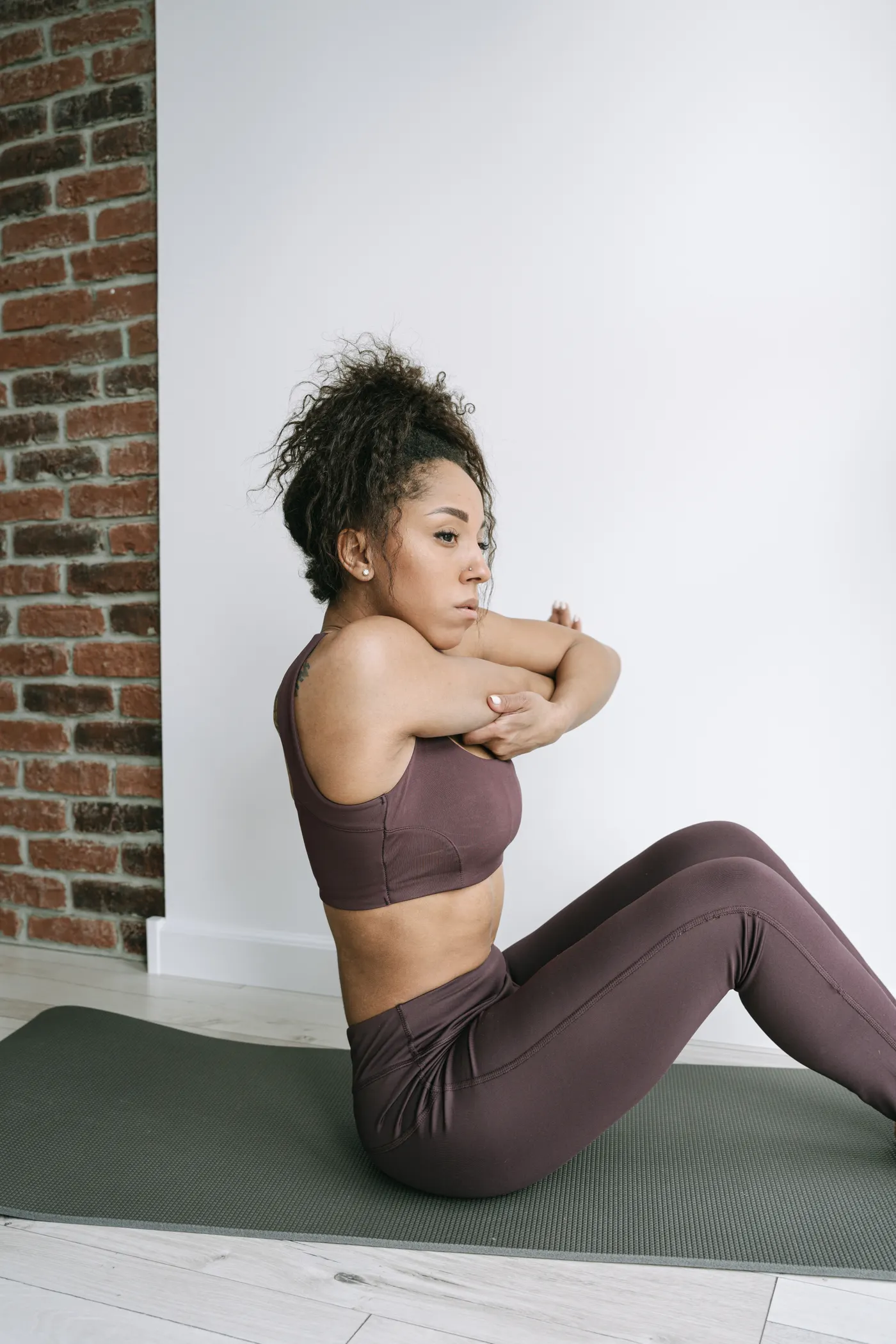 Woman stretching on a yoga mat