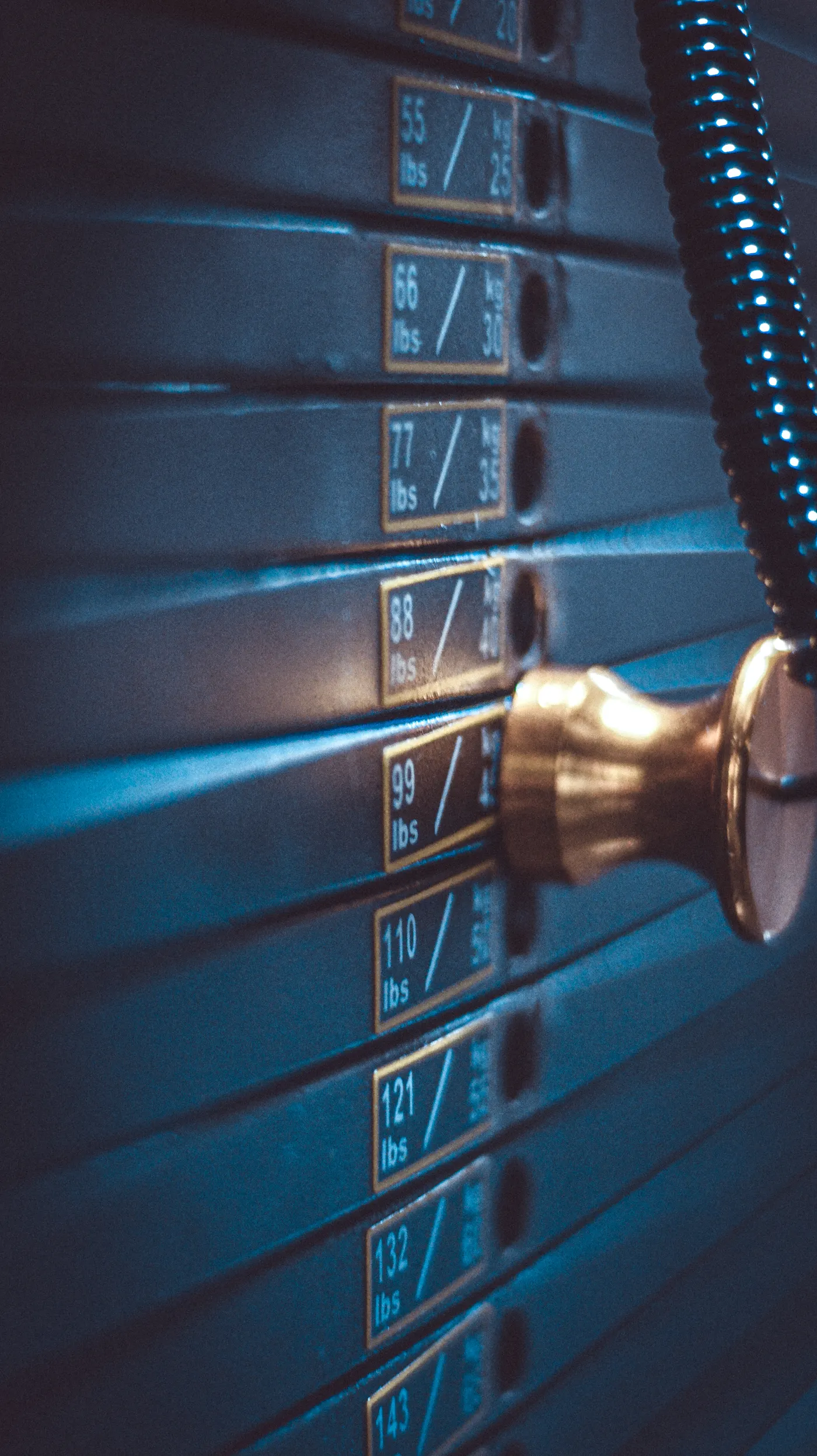 Close-up of adjustable weight stack on a resistance machine