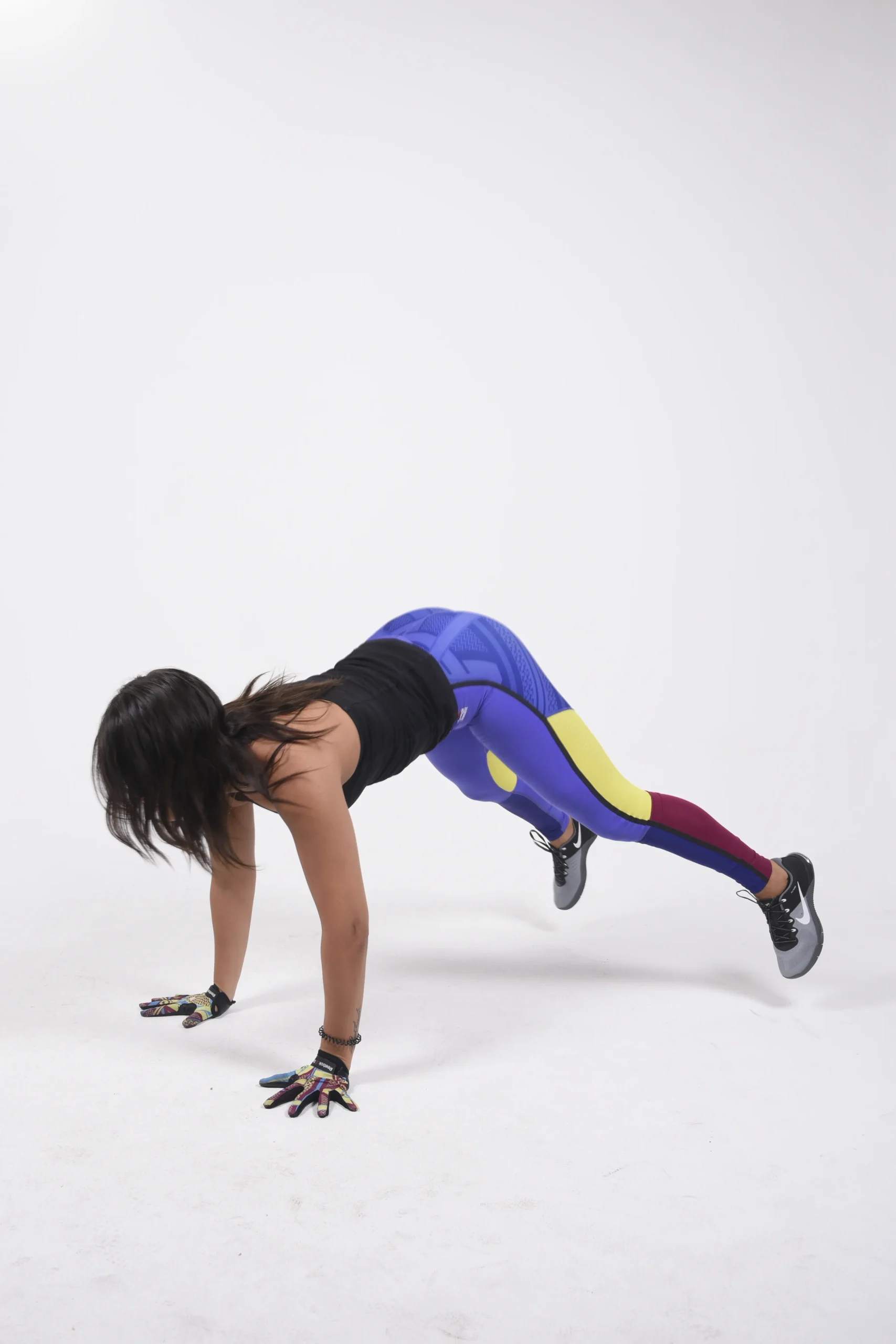Athlete performing a burpee during conditioning