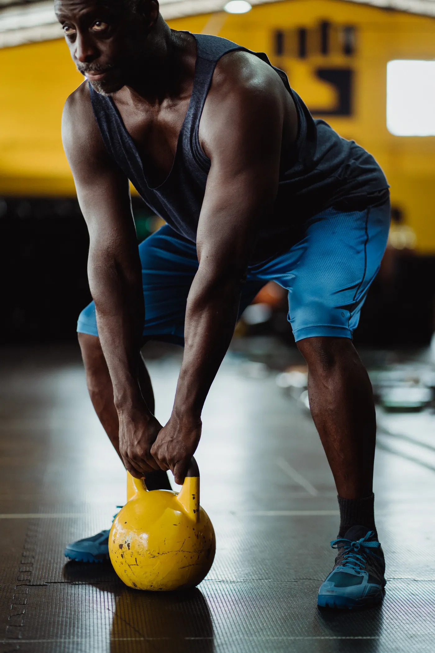 Athlete lifting a kettlebell during strength training
