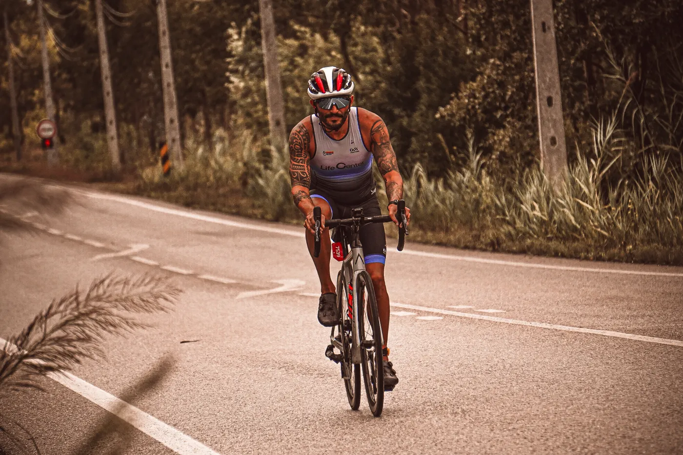 Athlete riding a road bicycle during an endurance training session