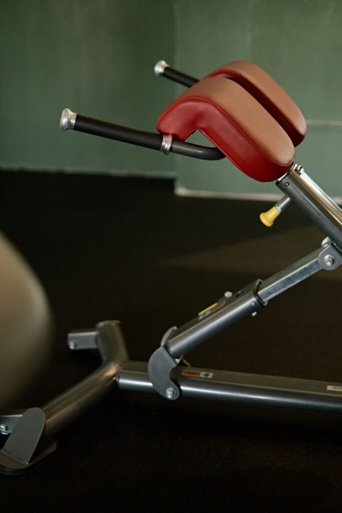 Padded back-extension machine in a gym