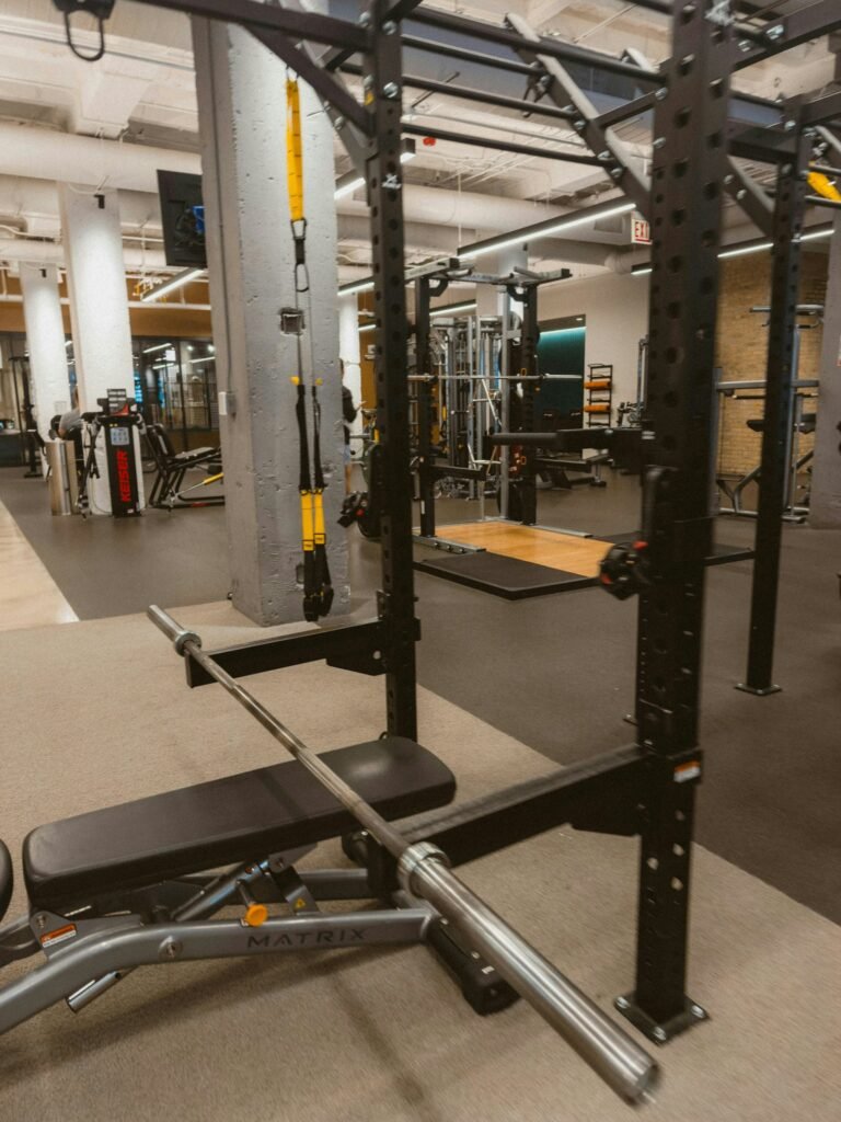 Strength-training barbell and bench equipment