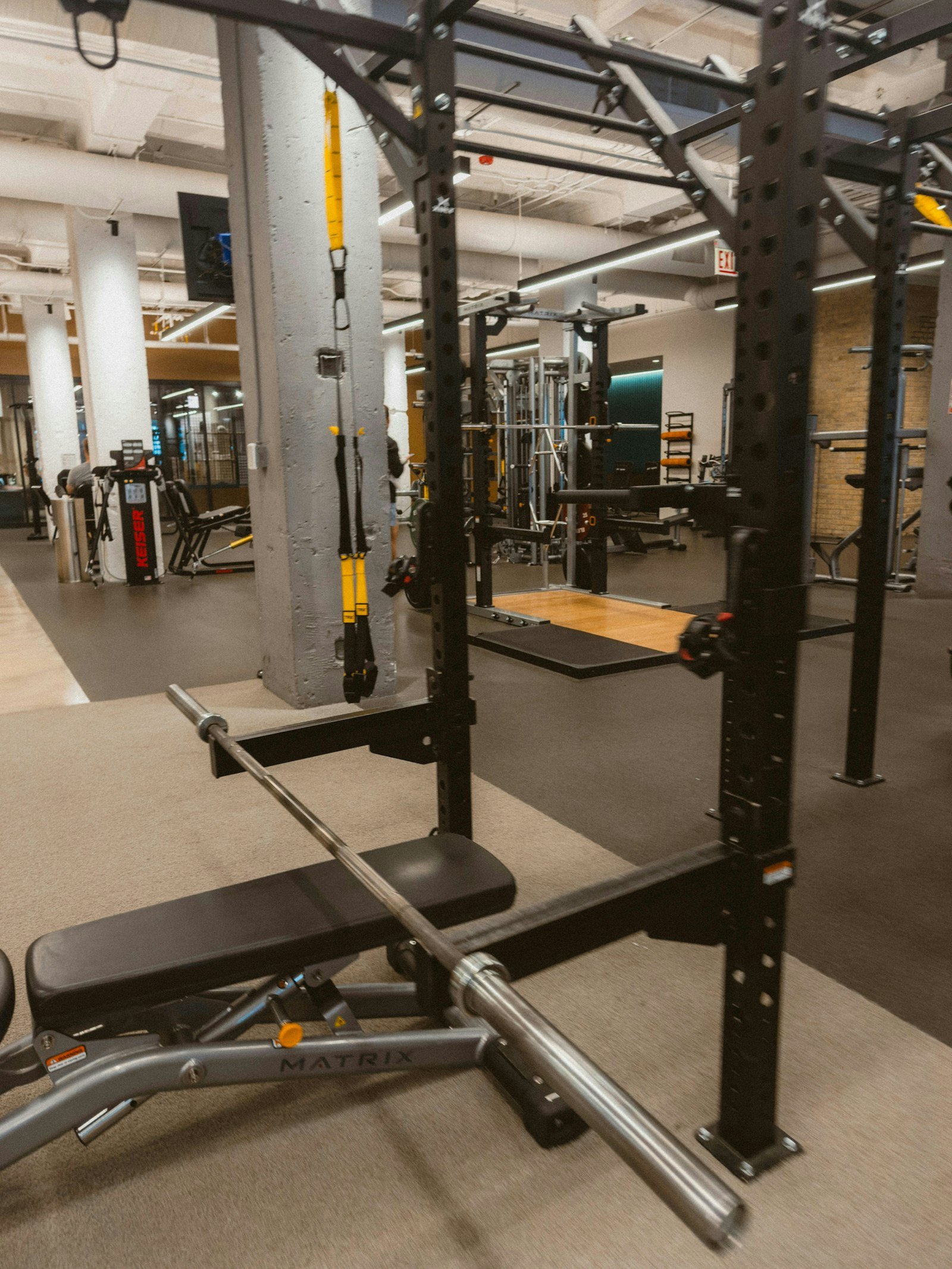 Strength-training barbell and bench equipment