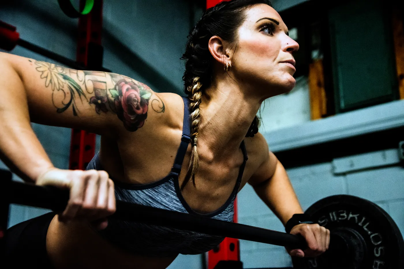 Woman lifting weights with controlled form