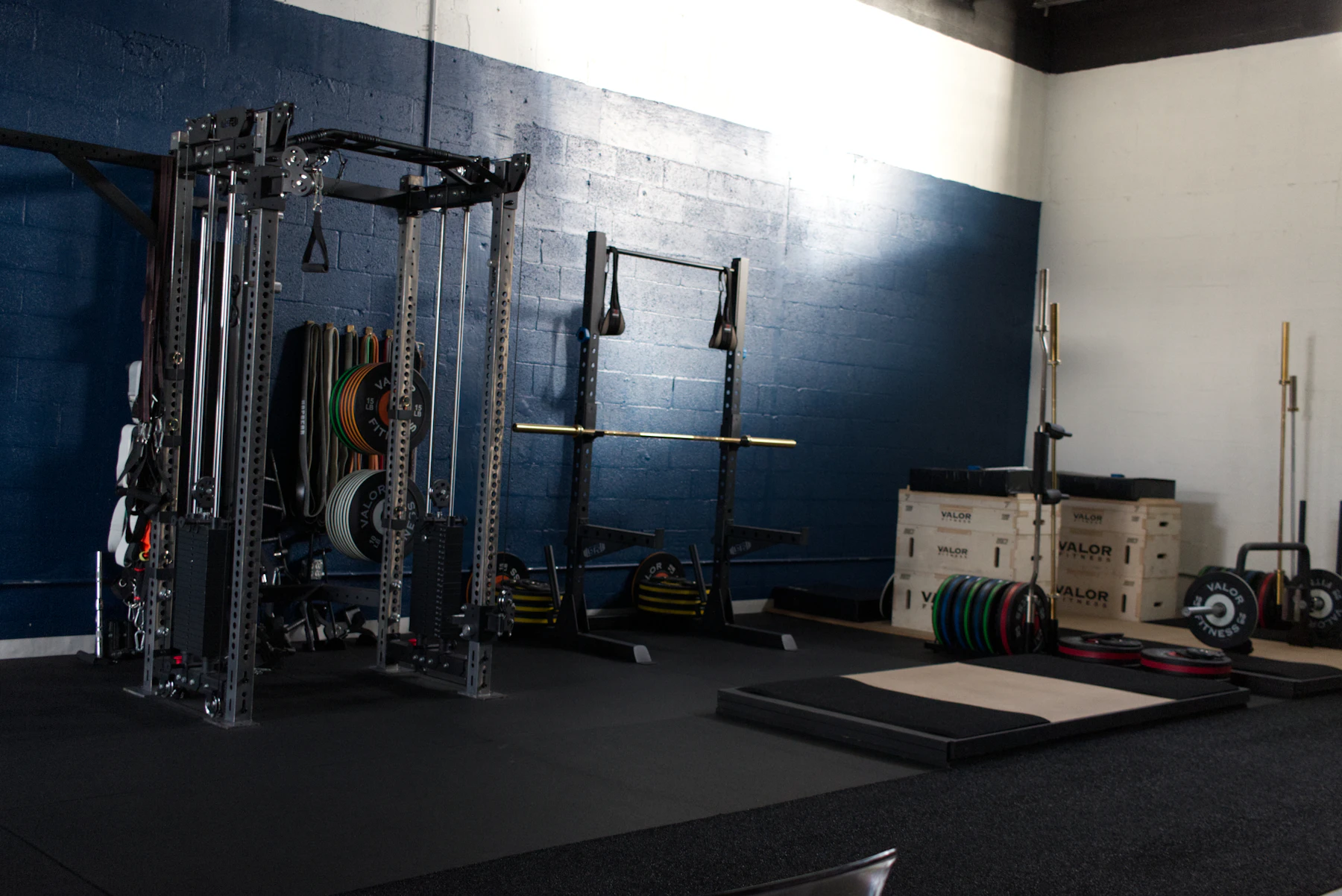 Strength-training area with free weights and equipment for structured workouts