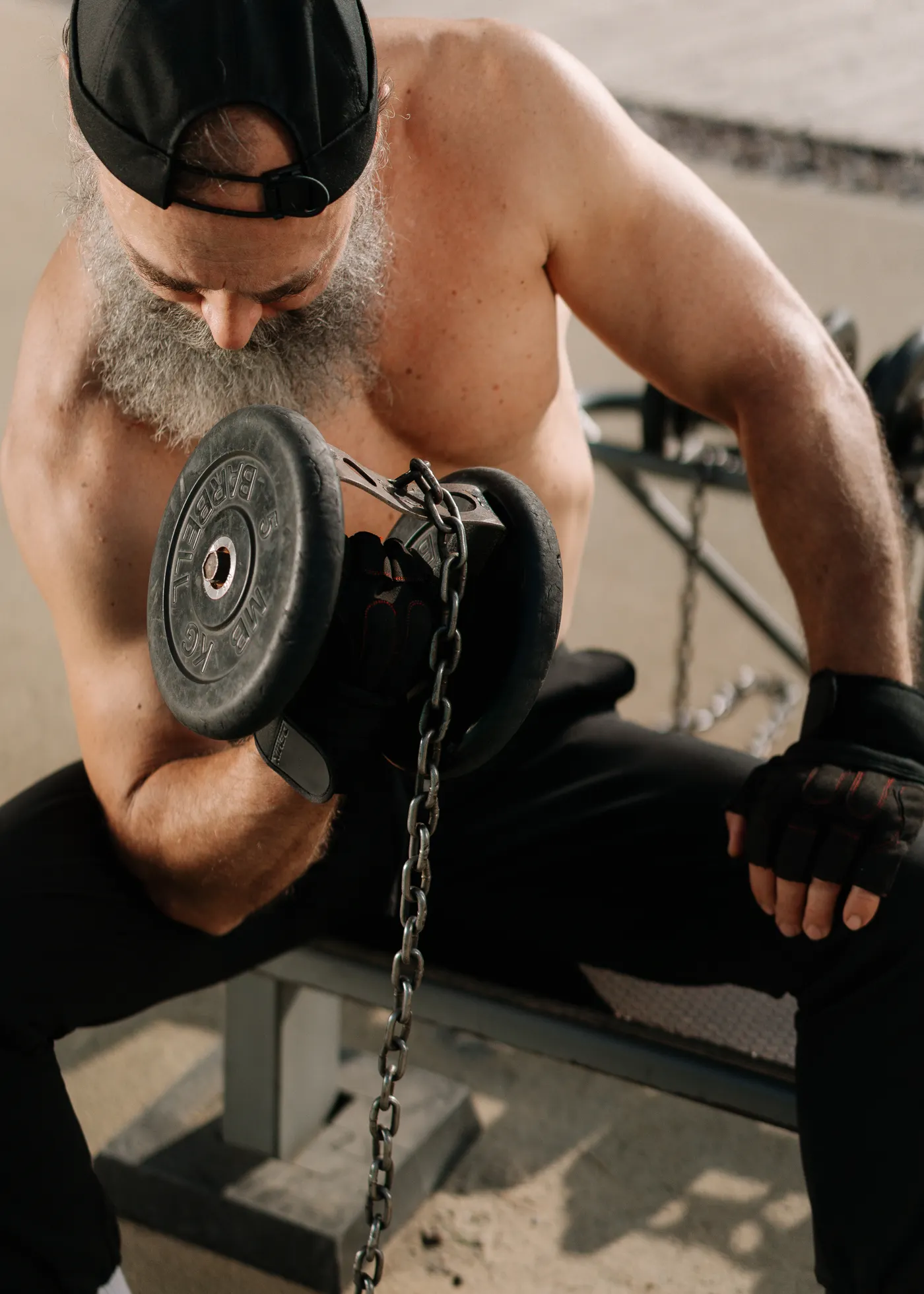 Older man lifting a dumbbell