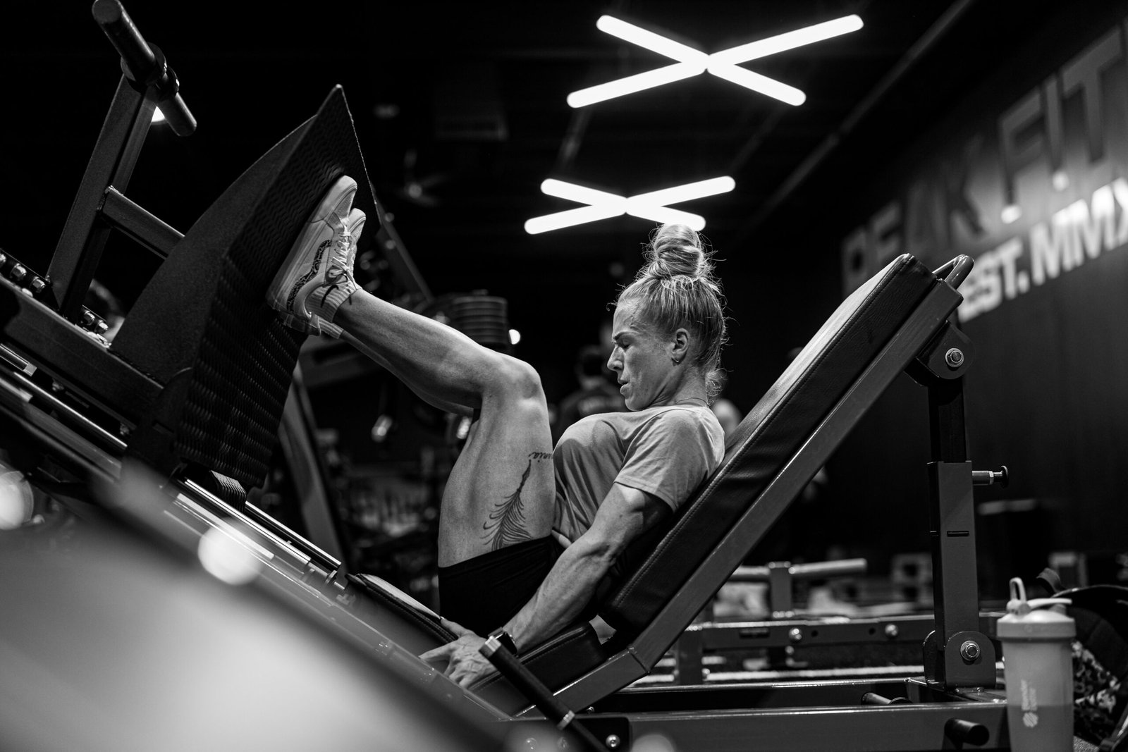 Woman using a leg press machine
