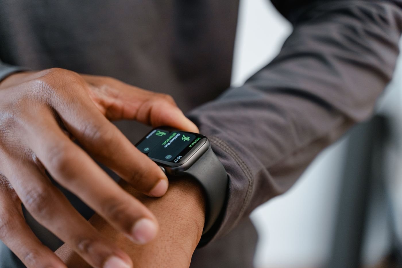 Close-up of a smartwatch being used to track activity