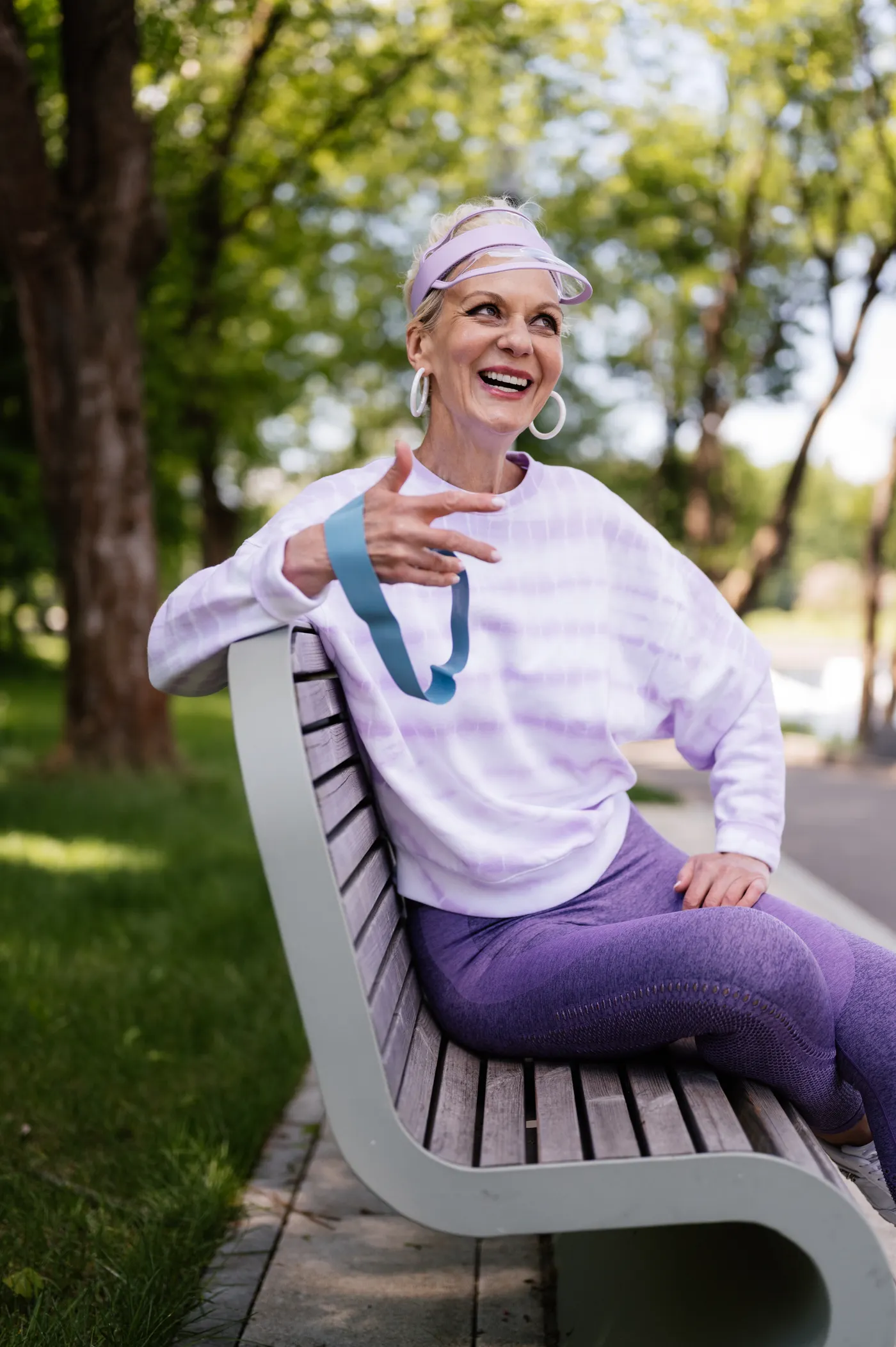 Woman holding a resistance band for a light exercise session