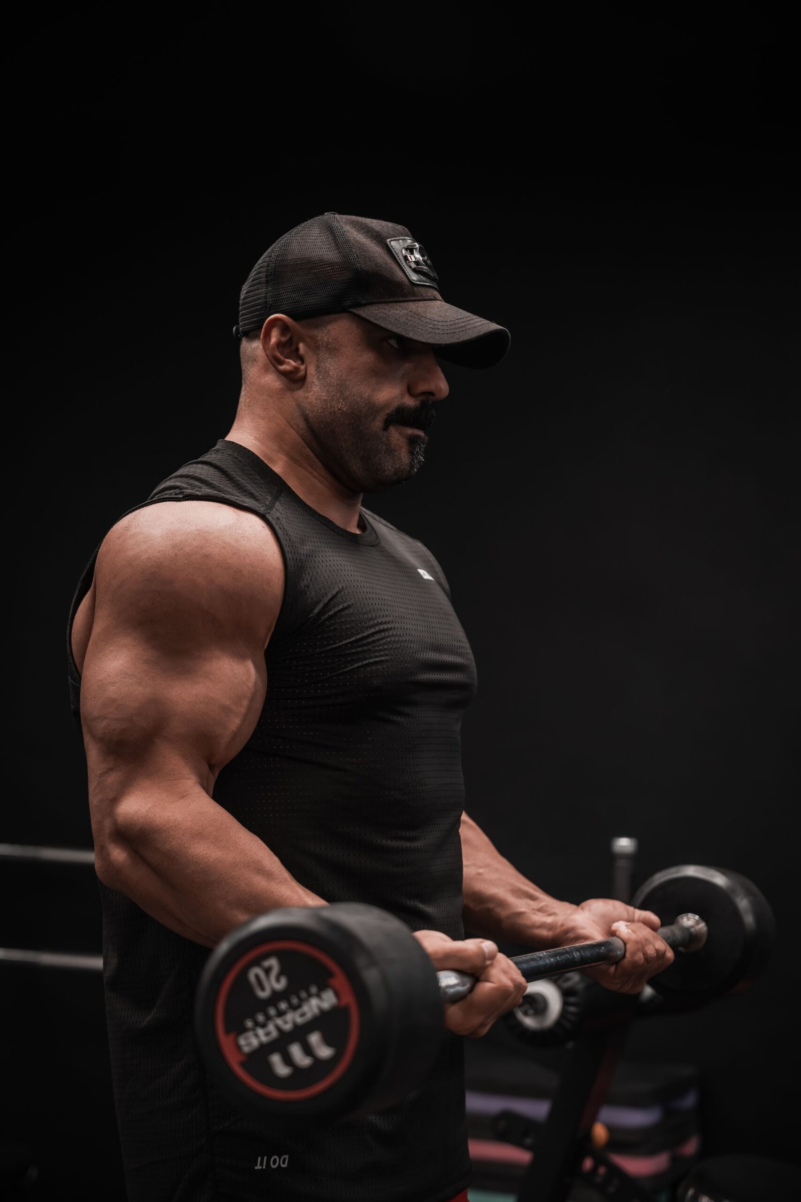 Athlete lifting dumbbells during strength training