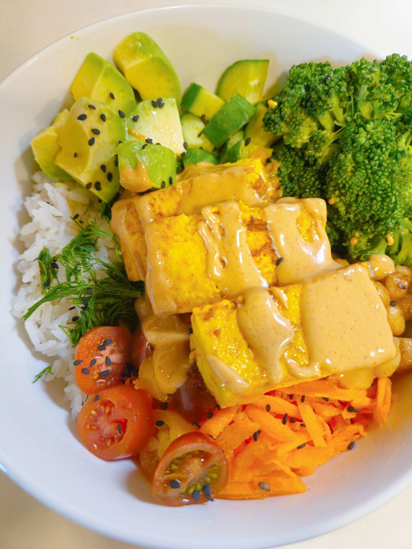 Colorful tofu and rice meal with vegetables