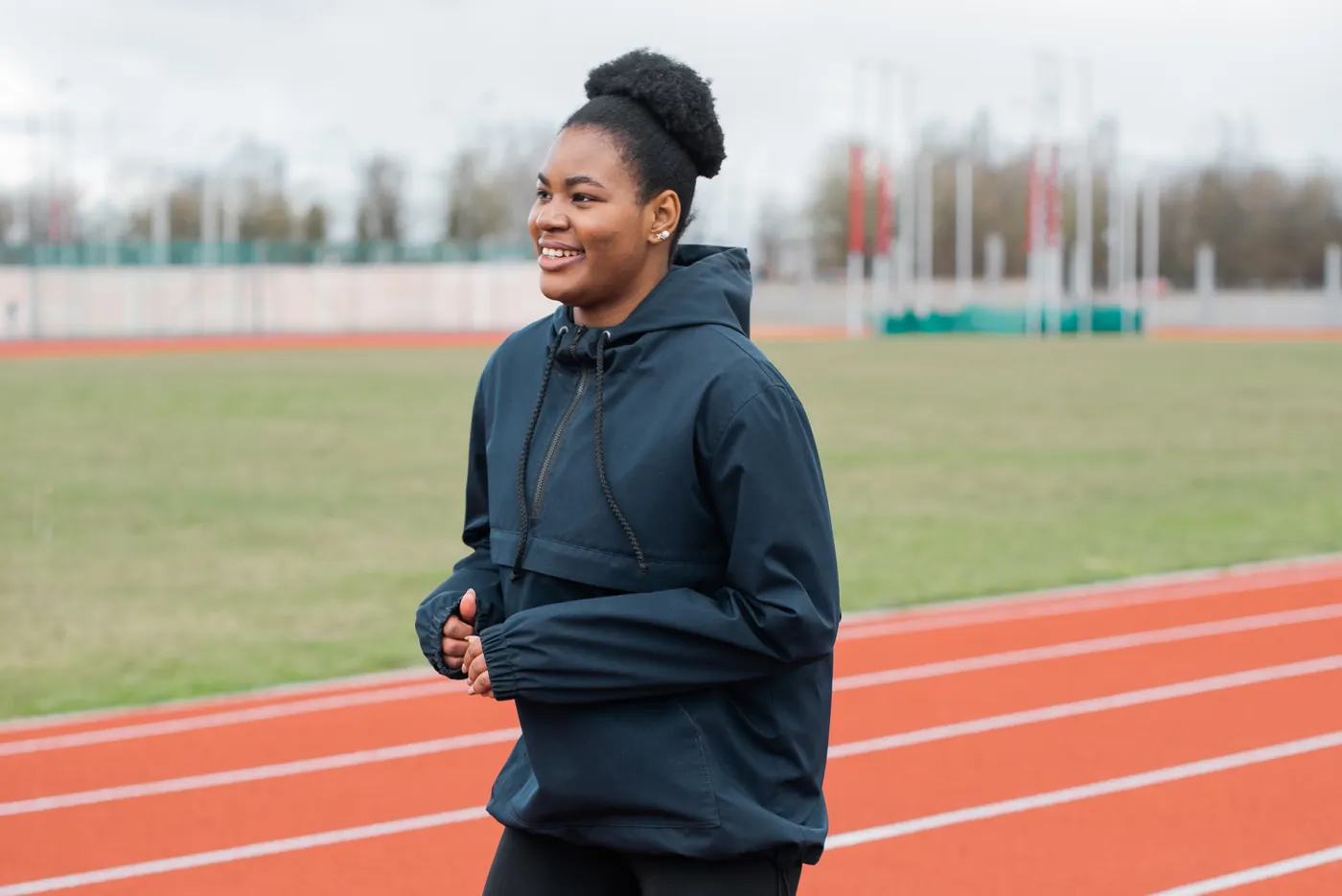 Woman jogging on an outdoor track