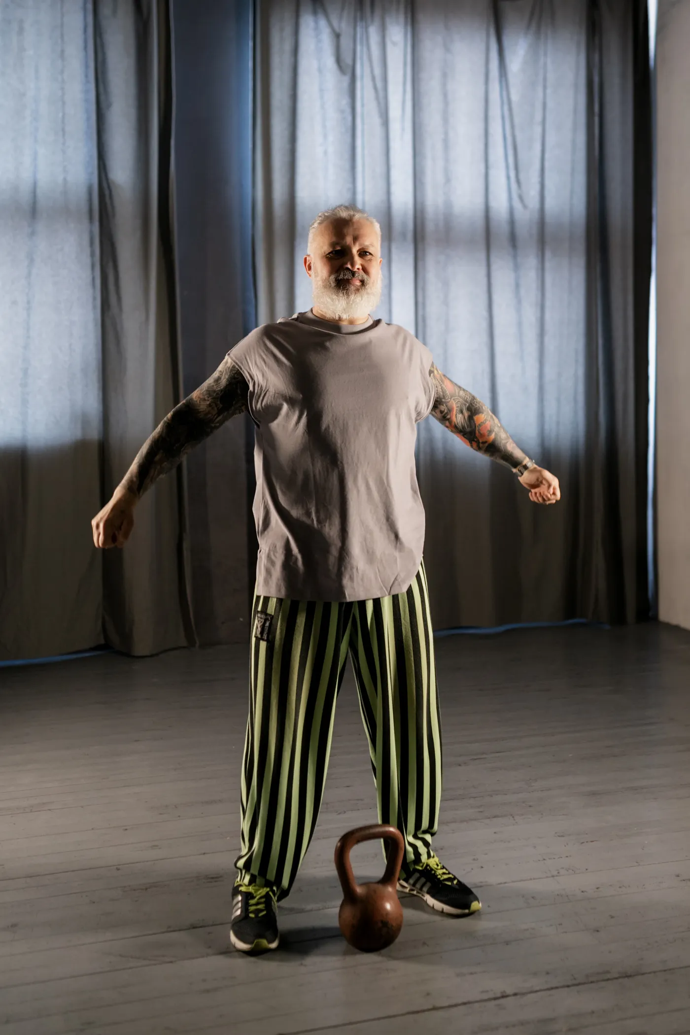 Senior man preparing for kettlebell training