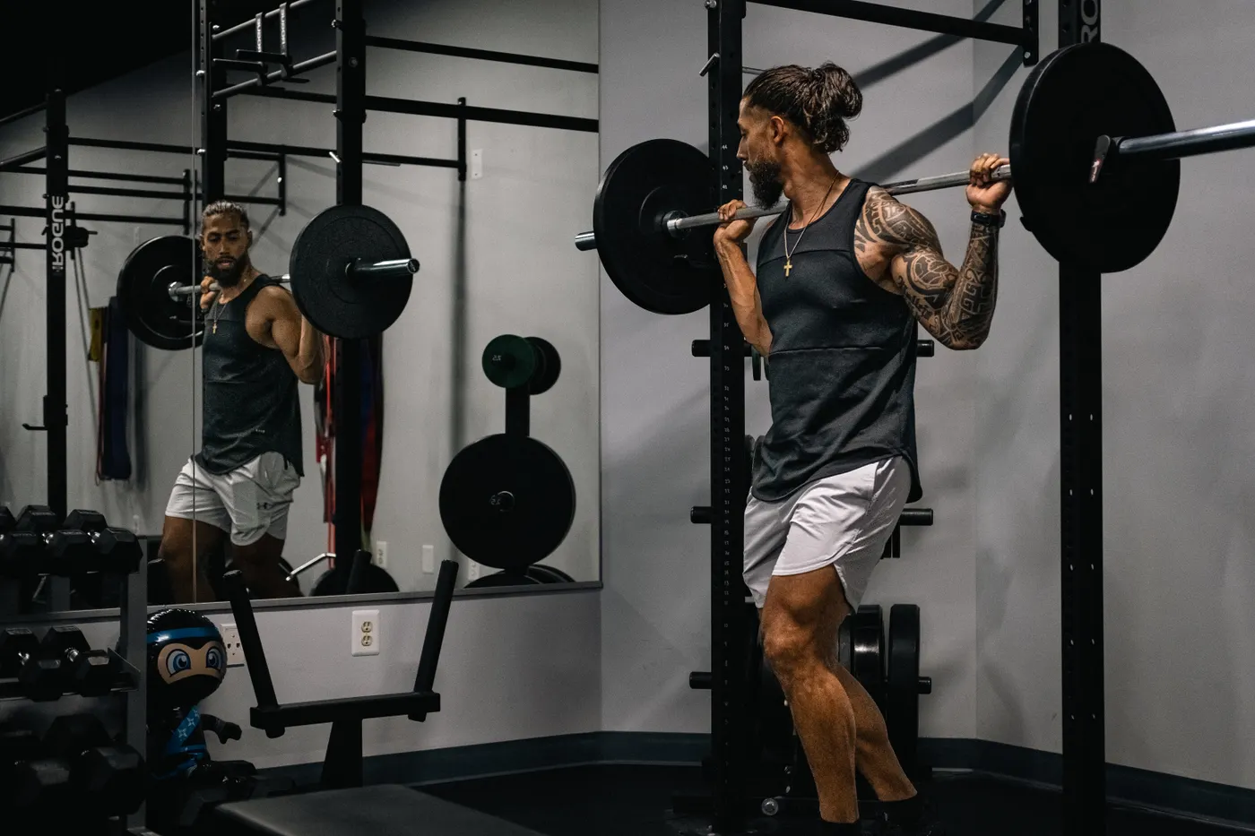 Lifter performing a barbell strength exercise