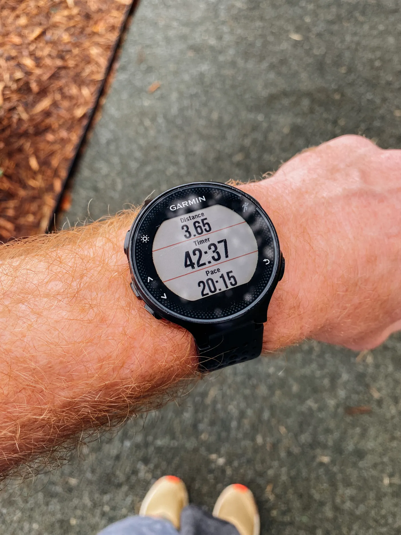 Fitness smartwatch showing running statistics