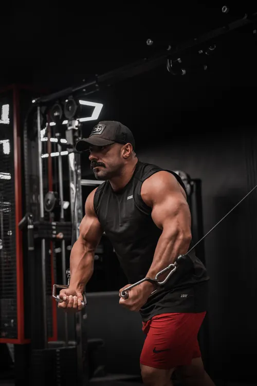 Athlete using a cable machine during resistance training
