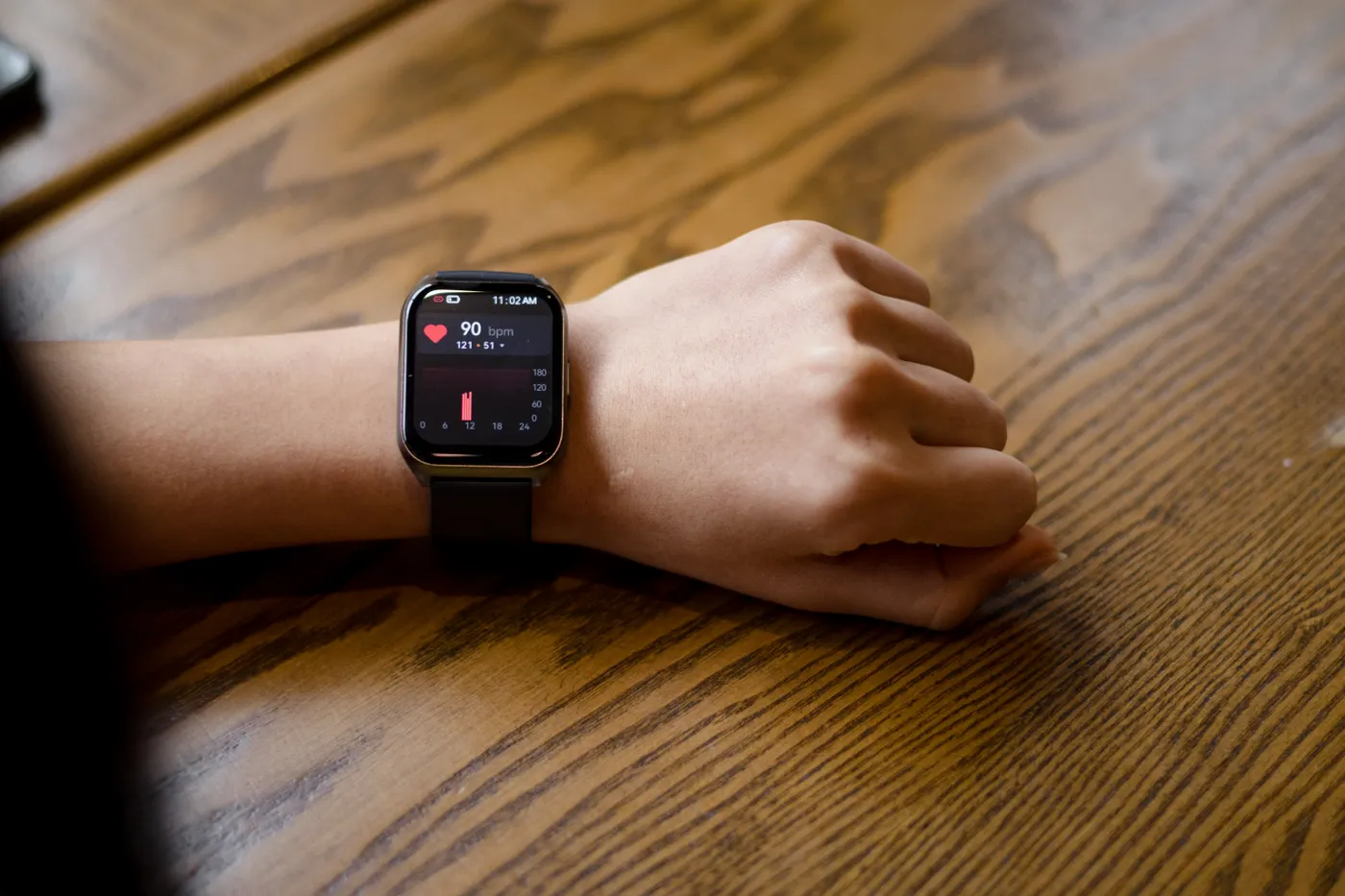 Smartwatch showing a heart-rate reading during recovery monitoring