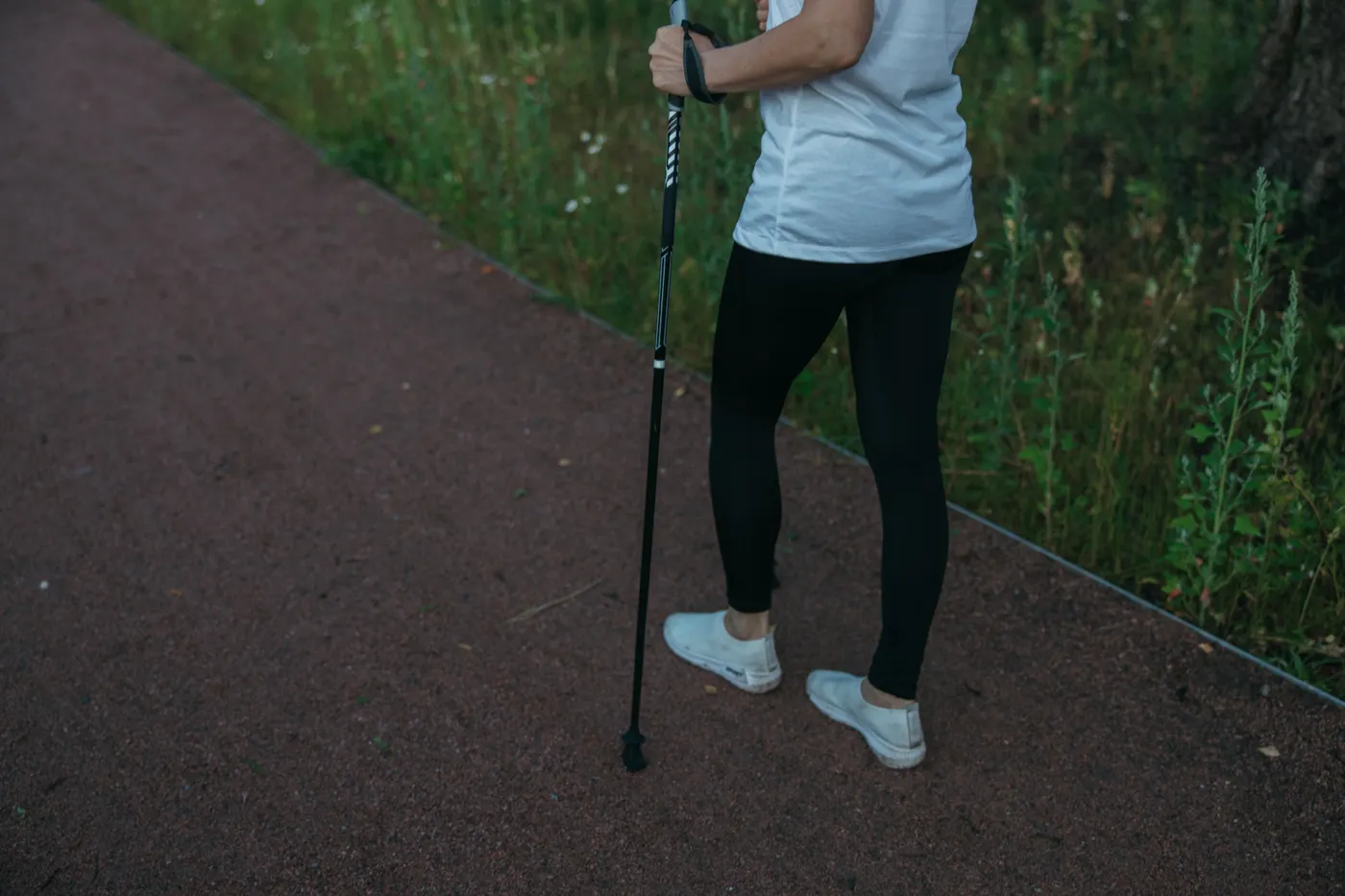 Person walking along a forest path for easy movement