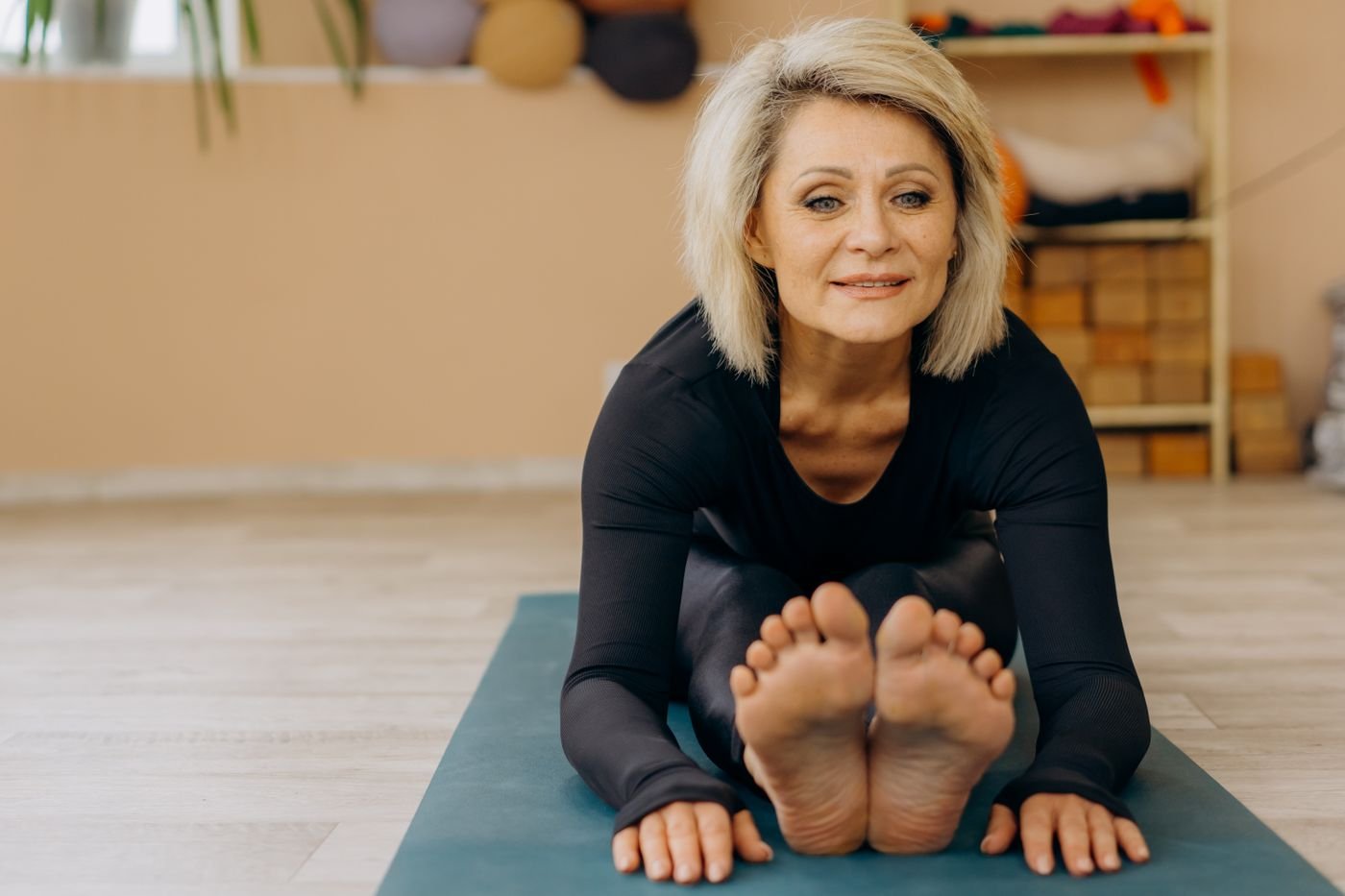 Older woman practicing a stable balance and movement exercise