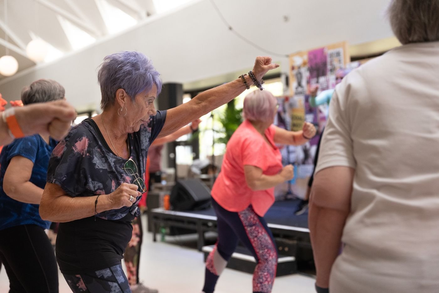 Group of older women exercising together in a fitness class