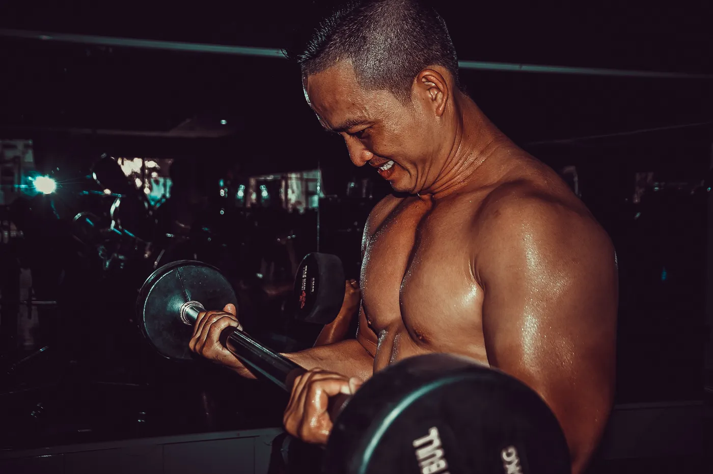 Athlete training with a loaded barbell