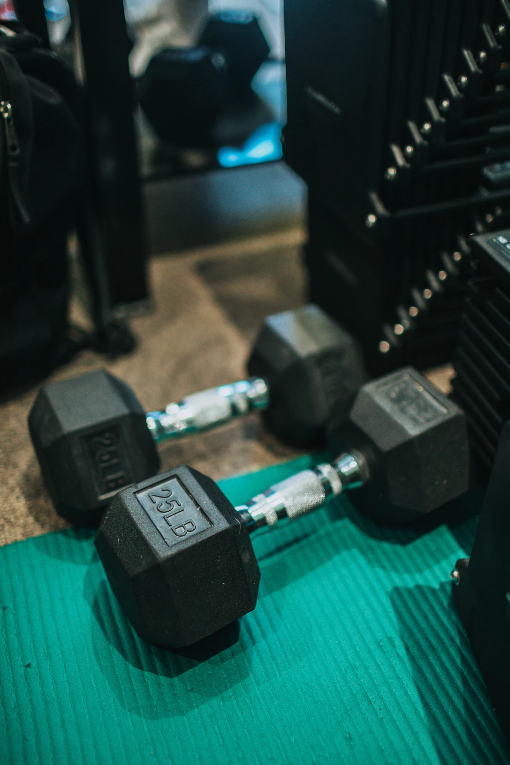 Two dumbbells illustrating conventional resistance training