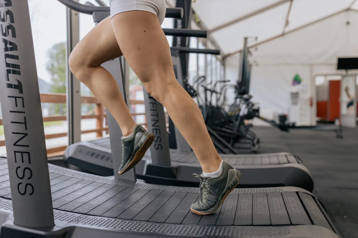 Runner's legs moving on a treadmill during a steady aerobic workout