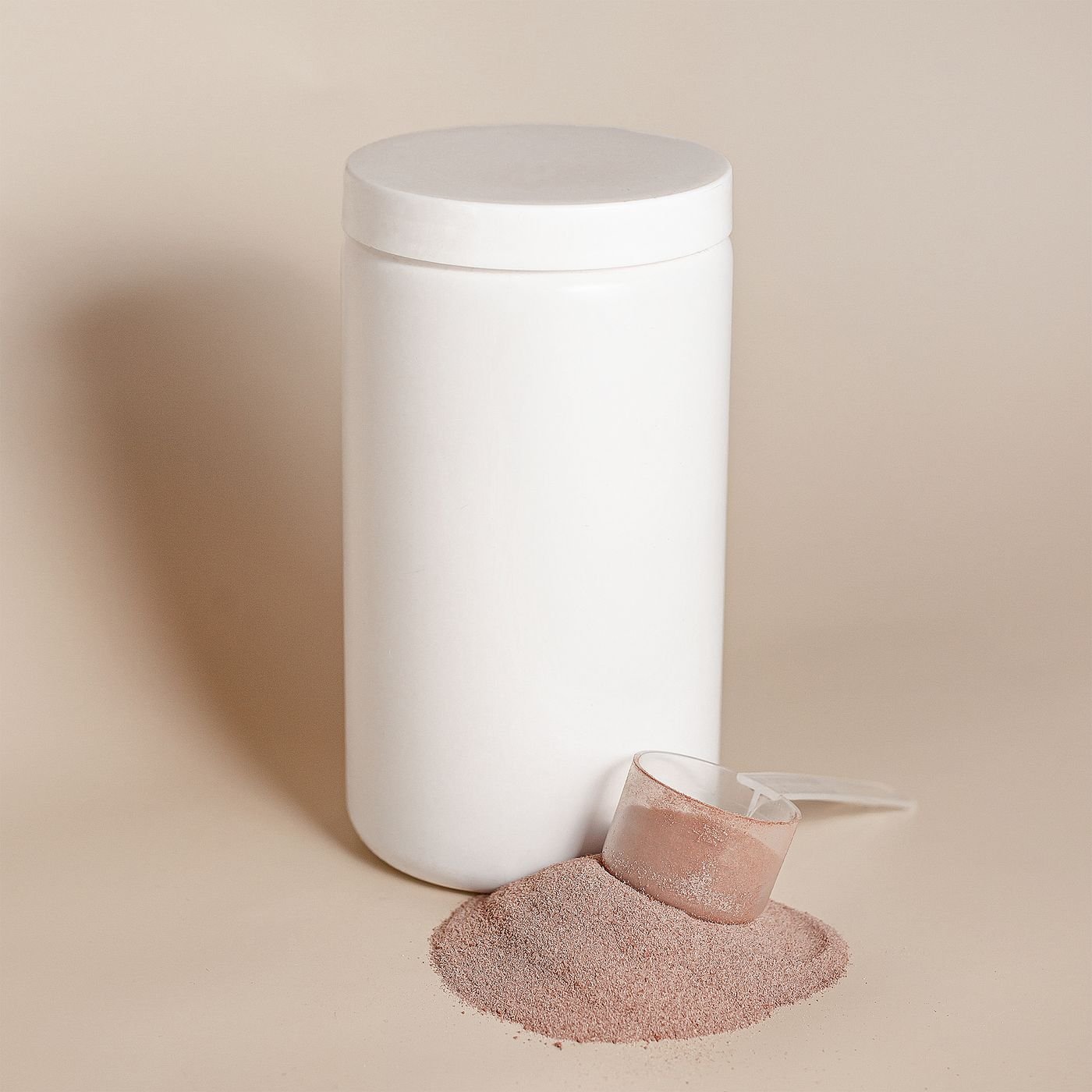 Unbranded white supplement powder and measuring scoop
