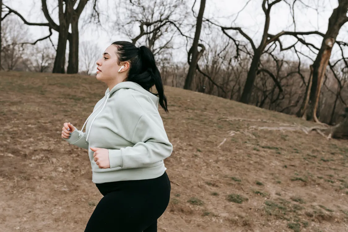 Woman jogging in an outdoor park